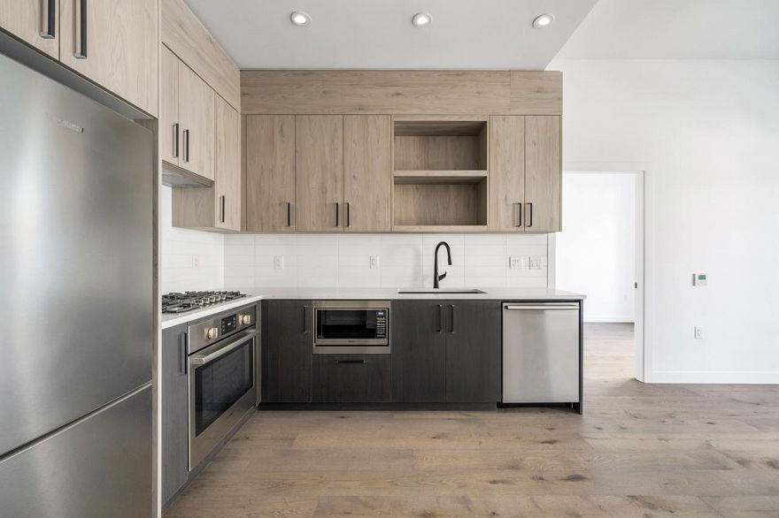 104 6859 Cambie Street