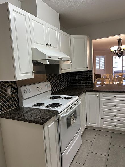 203 1958 E 47th Avenue