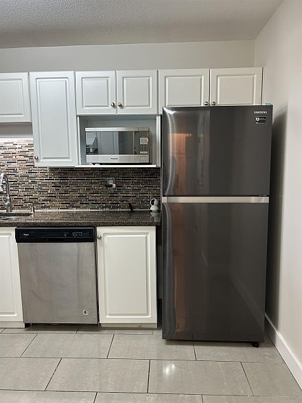 203 1958 E 47th Avenue