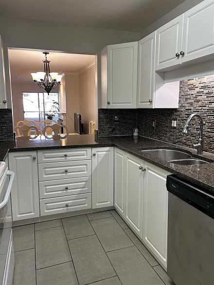 203 1958 E 47th Avenue