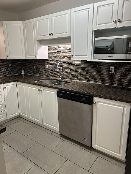 203 1958 E 47th Avenue