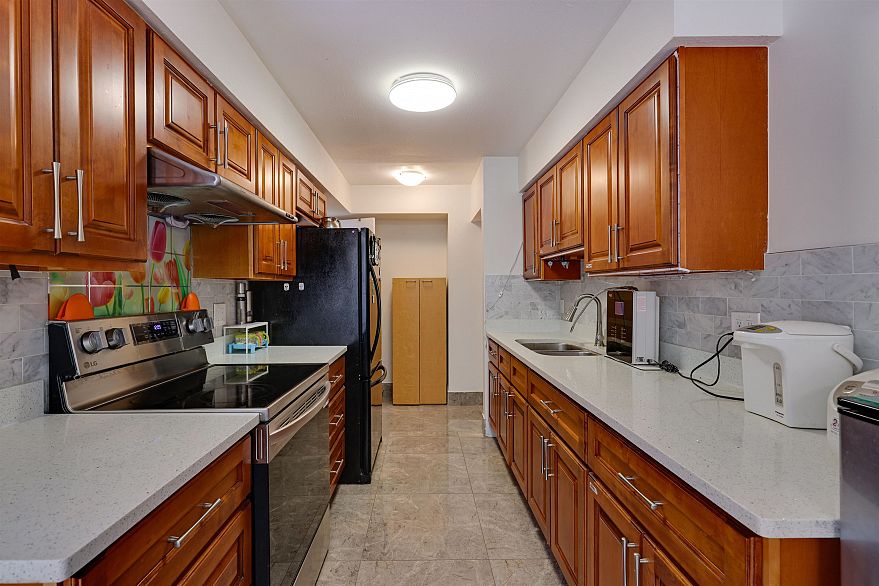 76 3437 E 49th Avenue