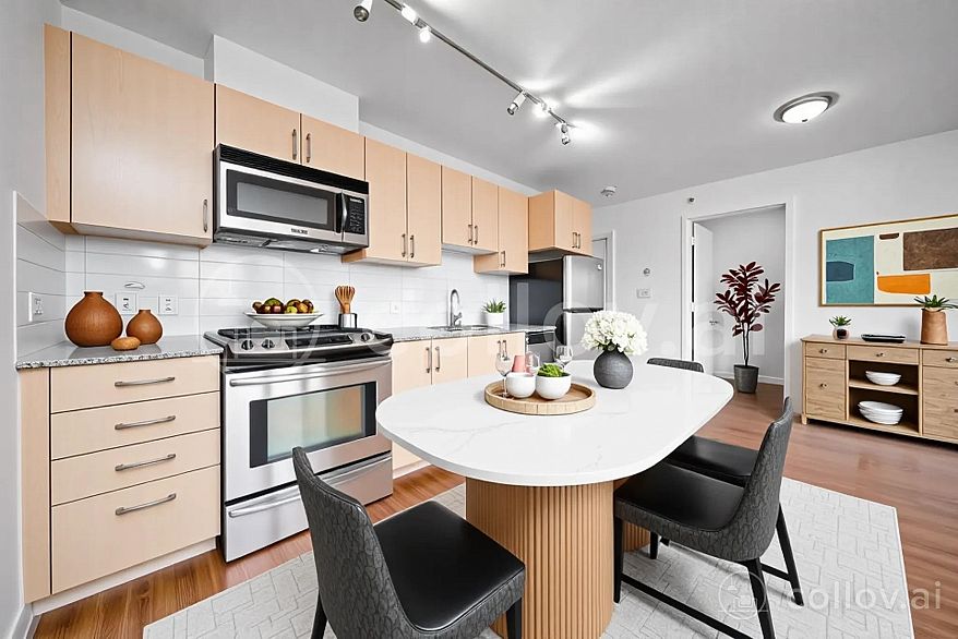 708 1068 W Broadway