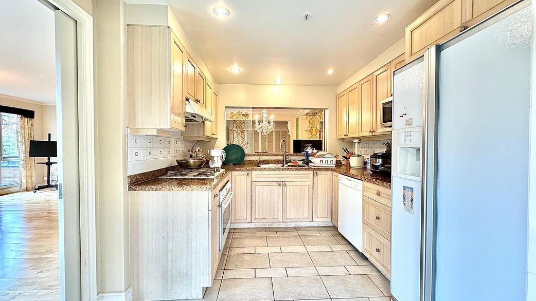 412 618 W 45th Avenue