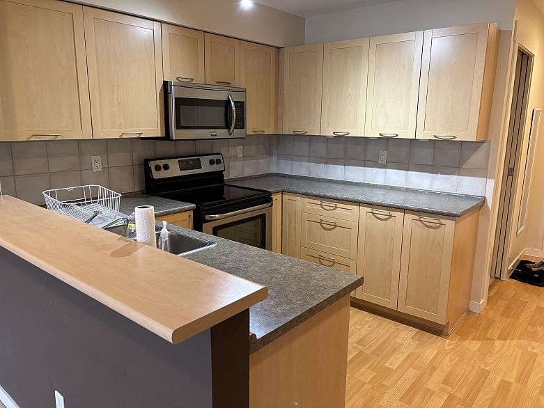 215 1503 W 65th Avenue