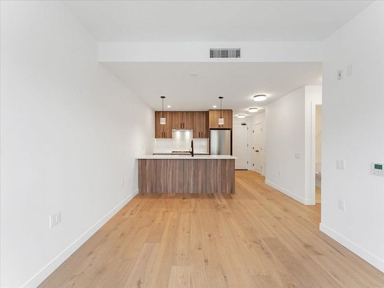 201 6859 Cambie Street