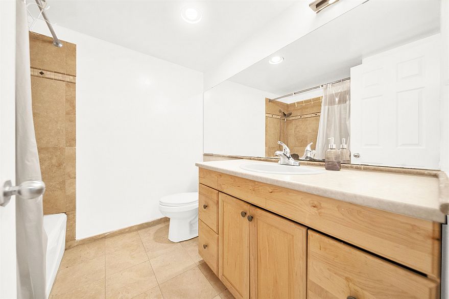 202 8707 Hudson Street