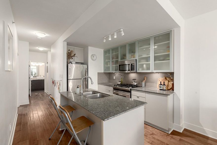 412 298 E 11th Avenue