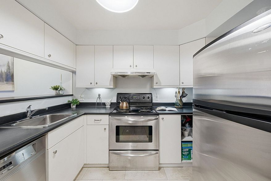 203 555 E 8th Avenue