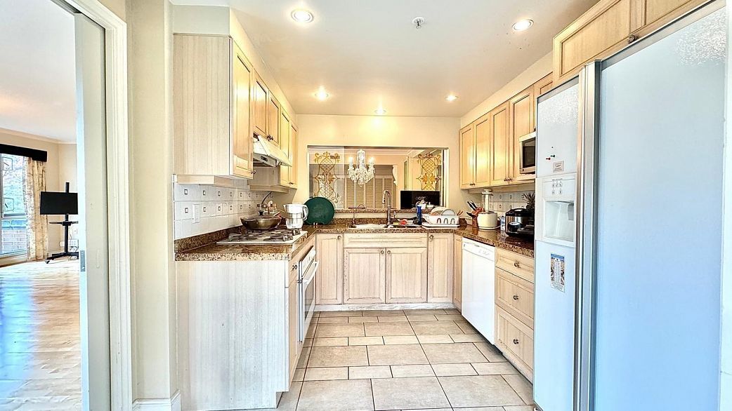 412 618 W 45th Avenue