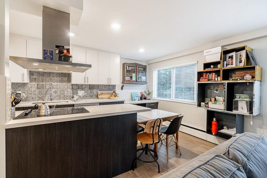 213 36 E 14th Avenue