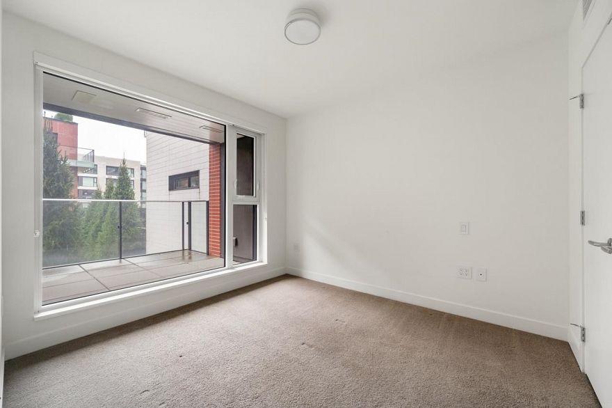 203 1561 W 57th Avenue