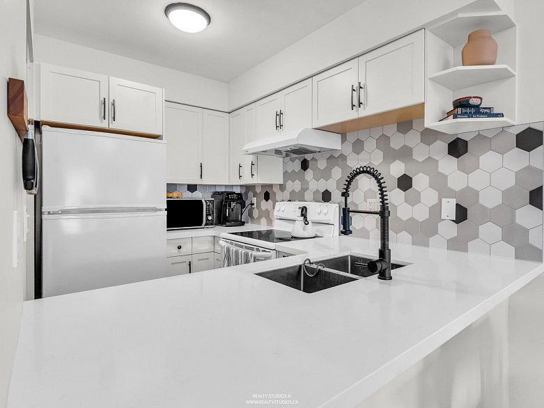 202 507 E 6th Avenue