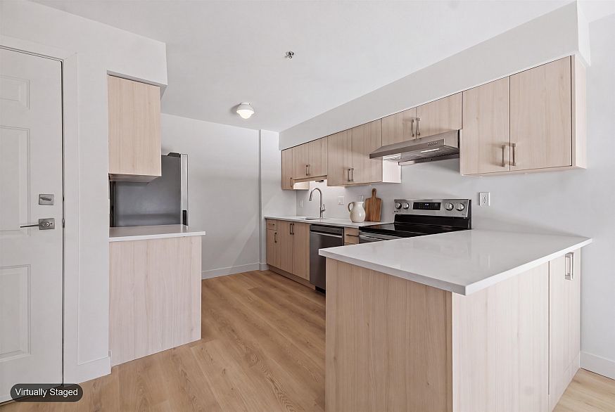 306 2928 Commercial Drive