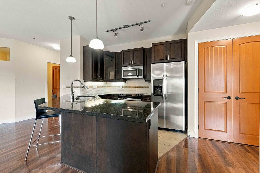 216 11935 Burnett Street