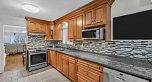 1237 E 64th Avenue