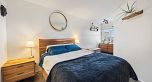PH8 1988 E 49th Avenue
