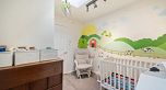 PH8 1988 E 49th Avenue