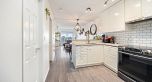 PH8 1988 E 49th Avenue