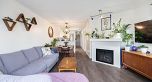 PH8 1988 E 49th Avenue