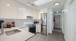 PH8 1988 E 49th Avenue