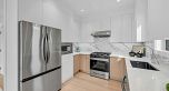 3 262 E 65th Avenue