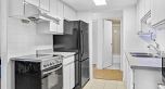 303 975 E Broadway