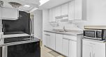 303 975 E Broadway