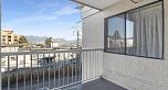 303 975 E Broadway