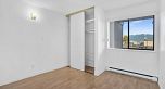 303 975 E Broadway