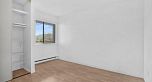 303 975 E Broadway