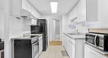 303 975 E Broadway
