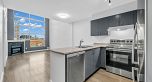 319 418 E Broadway