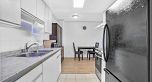 303 975 E Broadway