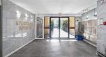 303 975 E Broadway