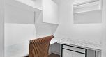 303 975 E Broadway