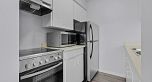 303 458 E 44th Avenue