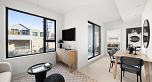 212 4928 Quebec Street