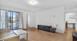 303 975 E Broadway
