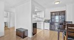 303 975 E Broadway