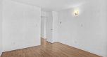 303 975 E Broadway