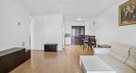 303 975 E Broadway