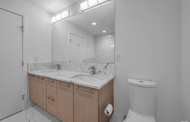 303 5077 Cambie Street Cambie