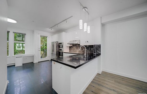 6612 Arbutus Street S.W. Marine