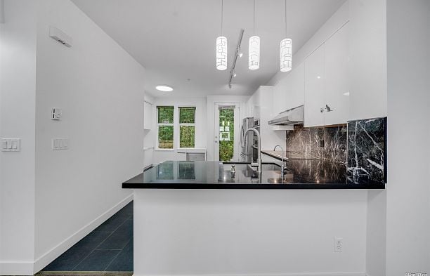 6612 Arbutus Street S.W. Marine