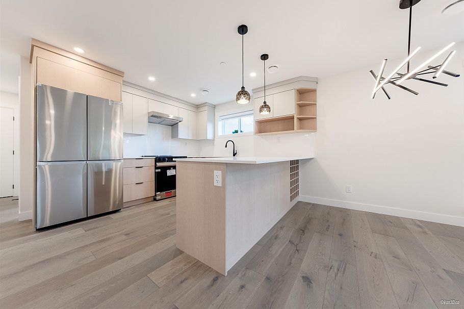 202 5092 Slocan Street Vancouver, BC - 1